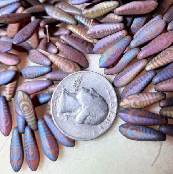 Shop Wyoming 16x5mm Laser Etched Matte Rainbow Peacock on Red and Yellow Opaline Dagger Beads 12ct