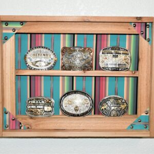 Shop Wyoming Western Belt Buckle Display with Southwest Striped Vinyl Background