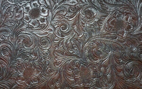 Shop Wyoming Western Belt Buckle Display with Tooled Faux Leather (Vinyl) Background