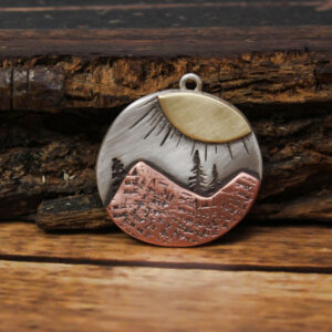 Shop Wyoming Oval Sunburst Mountain Pendant