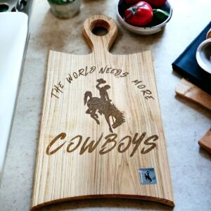 Shop Wyoming The World Needs More Cowboys Cutting Board