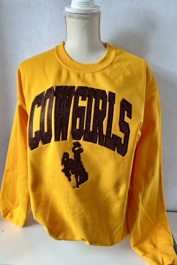 Shop Wyoming Cowgirls Glitter Sweatshirt