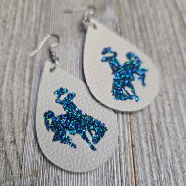 Shop Wyoming Bucking Horse & Rider®️ Leather Earrings~ Natural & Peacock Glitter
