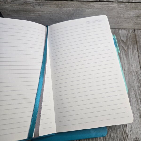 Shop Wyoming Big Bucking Horse Note Pad w/pen ~ Teal w/Black Tool