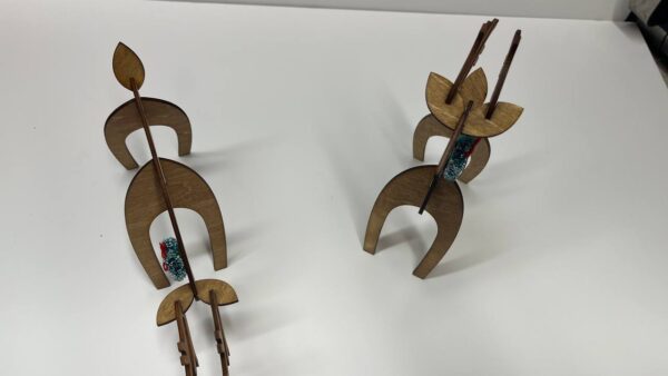 Shop Wyoming Wood Reindeer Decor – Standing & Grazing Reindeer with Wreath – Rustic Christmas Decoration