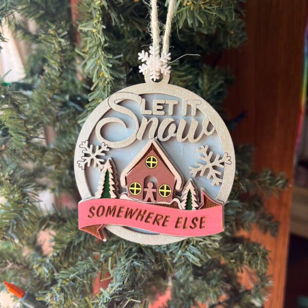 Shop Wyoming “Let It Snow Somewhere Else” Ornament – 3.5″ Round Layered Wood Funny Winter Tree Decor with Cottage & Snowflakes