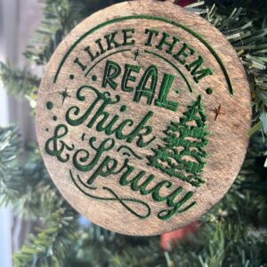 Shop Wyoming Funny Christmas Tree Ornament – “I Like Them Real Thick & Sprucy” – 3.25” Round Rustic Wood Holiday Decor – Hilarious Gag Gift for Tree Lovers