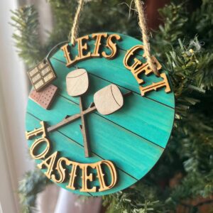 Shop Wyoming Funny Camping Ornament – “Let’s Get Toasted” S’mores Marshmallow Design – Rustic Campfire Christmas Decor – 3.25″ Round
