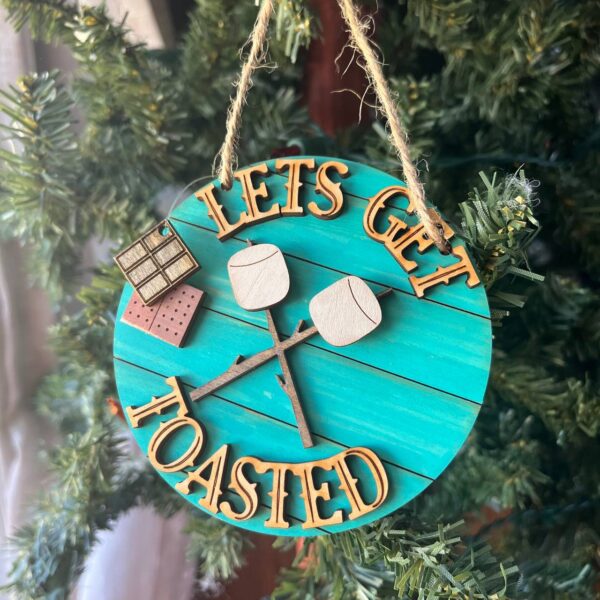 Shop Wyoming Funny Camping Ornament – “Let’s Get Toasted” S’mores Marshmallow Design – Rustic Campfire Christmas Decor – 3.25″ Round
