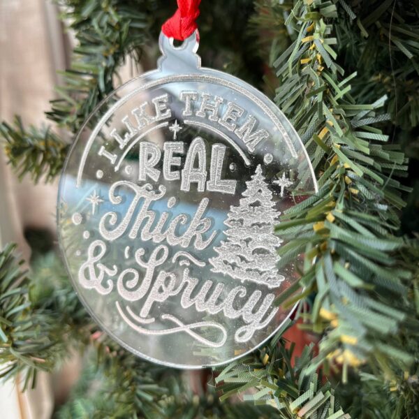 Shop Wyoming Funny Christmas Tree Ornament – “I Like Them Real Thick & Sprucy” – 3.25” Round Rustic Wood Holiday Decor – Hilarious Gag Gift for Tree Lovers