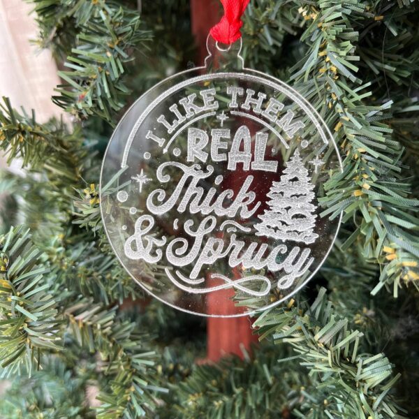 Shop Wyoming Funny Christmas Tree Ornament – “I Like Them Real Thick & Sprucy” – 3.25” Round Rustic Wood Holiday Decor – Hilarious Gag Gift for Tree Lovers