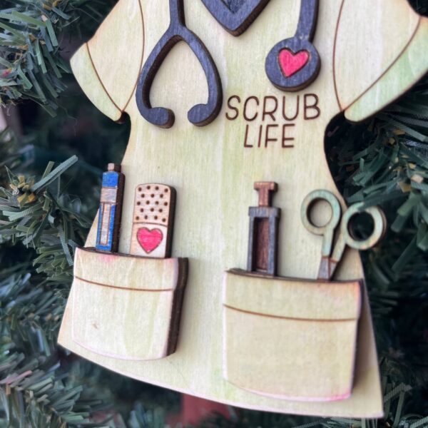 Shop Wyoming Scrub Life Nurse Ornament – Handmade Wood Medical Christmas Decoration for Nurses, CNAs, and Healthcare Workers – 4″ Tall Scrubs Tree Ornament