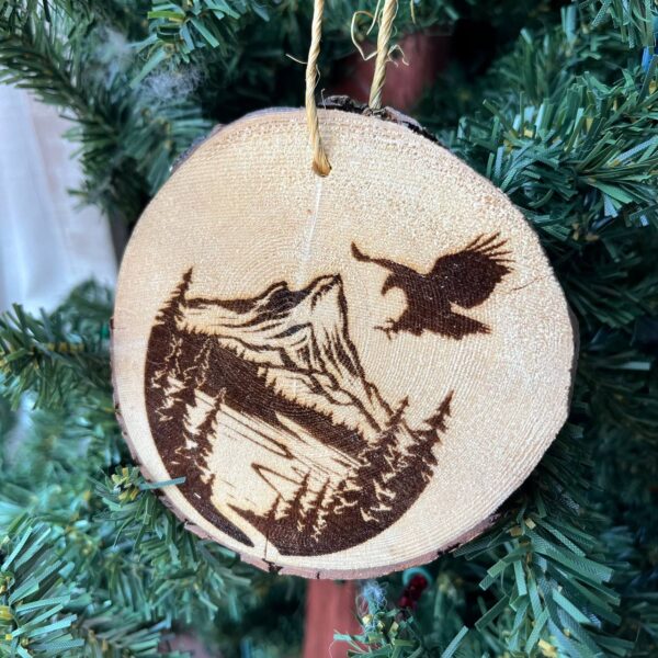 Shop Wyoming Engraved Eagle & Mountain Ornament on Natural Pine Wood – Rustic Wildlife Christmas Tree Decor – 3.25″-4″ Round
