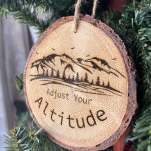 Shop Wyoming Adjust Your Altitude Engraved Pine Wood Ornament – Rustic Mountain Quote Tree Slice – Locally Sourced 3.25″-4″ Round Nature Gift
