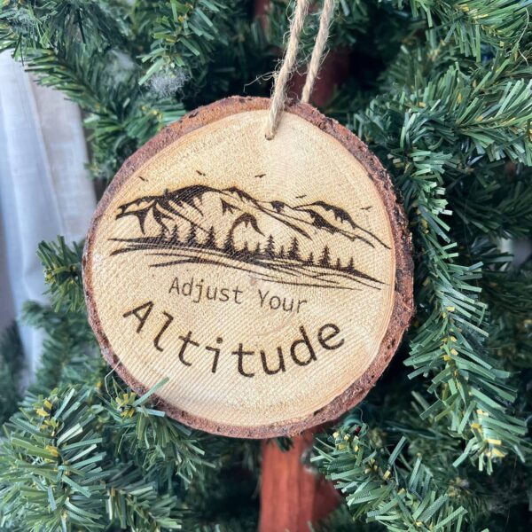 Shop Wyoming Adjust Your Altitude Engraved Pine Wood Ornament – Rustic Mountain Quote Tree Slice – Locally Sourced 3.25″-4″ Round Nature Gift