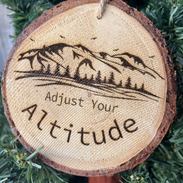 Shop Wyoming Adjust Your Altitude Engraved Pine Wood Ornament – Rustic Mountain Quote Tree Slice – Locally Sourced 3.25″-4″ Round Nature Gift