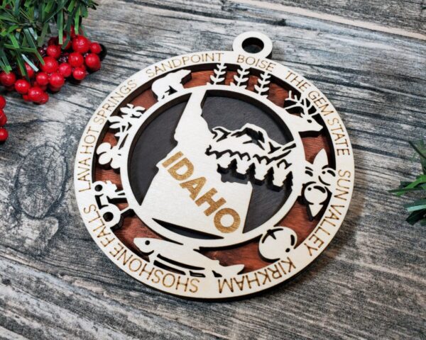Shop Wyoming Idaho State Ornament – 3.25” Round Laser Cut Wooden Christmas Ornament | Idaho Gift for Campers, Skiers, Outdoor Adventurers & Gem State Travelers