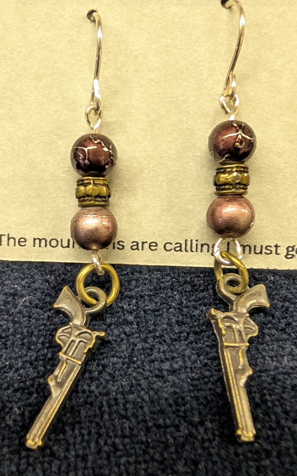 Shop Wyoming Earthtone Gun Charm Earrings Shop Wyoming Earthtone Gun Charm Earrings