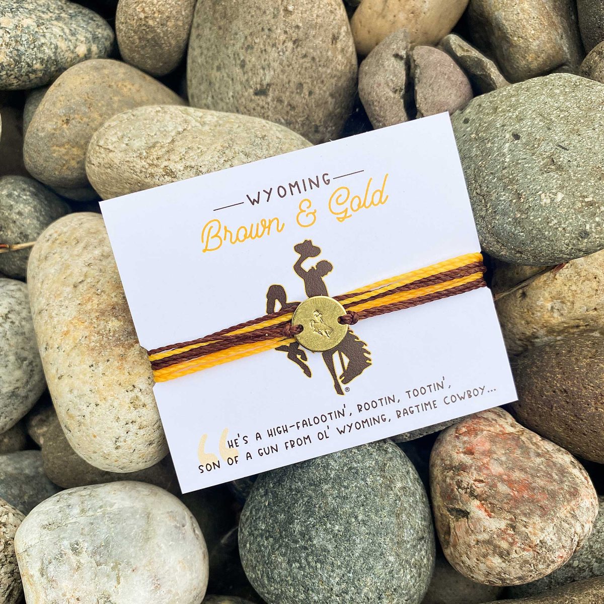 Shop Wyoming Wyoming Cowboys Brown and Gold Bracelet (Limited Edition) Shop Wyoming Wyoming Cowboys Brown and Gold Bracelet (Limited Edition)
