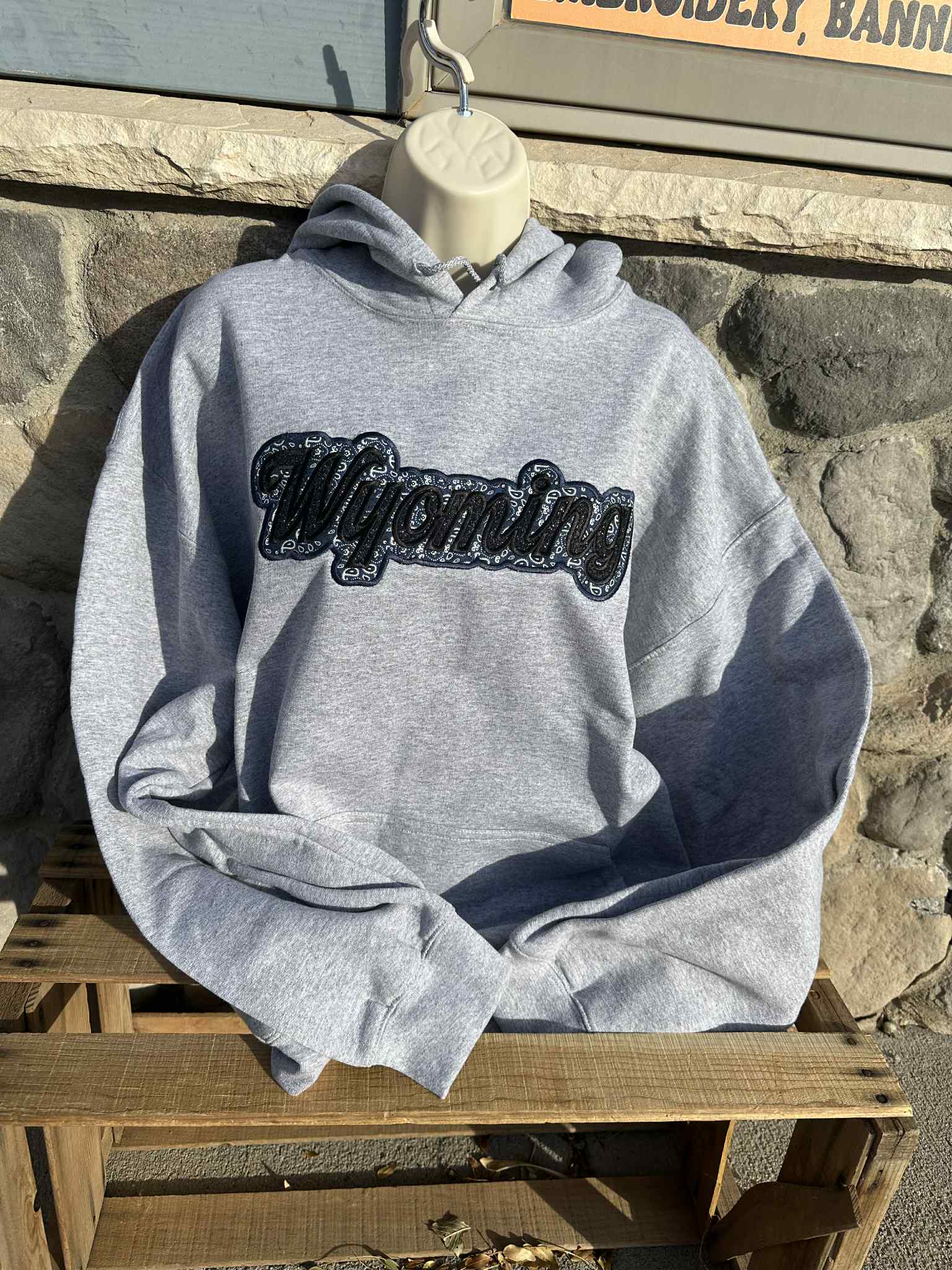 Shop Wyoming Wyoming black sparkles with blue western applique Embroidery Hoodie Shop Wyoming Wyoming black sparkles with blue western applique Embroidery Hoodie