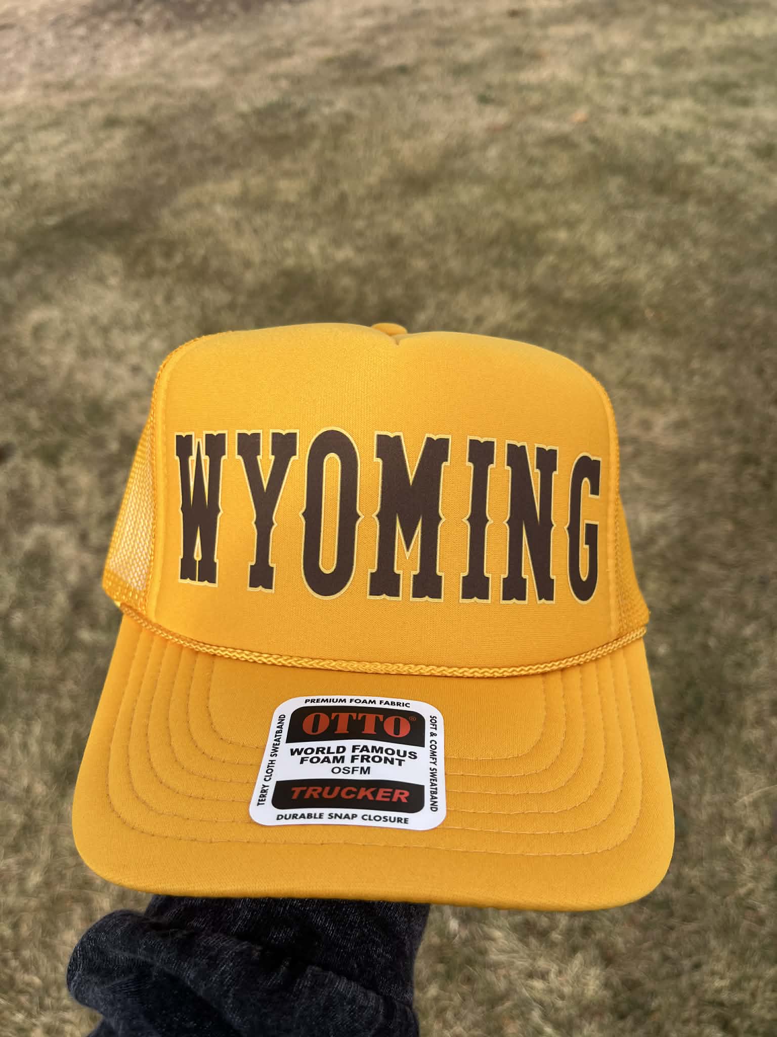 Shop Wyoming Wyoming Varsity Trucker Hat Choose your color Shop Wyoming Wyoming Varsity Trucker Hat Choose your color