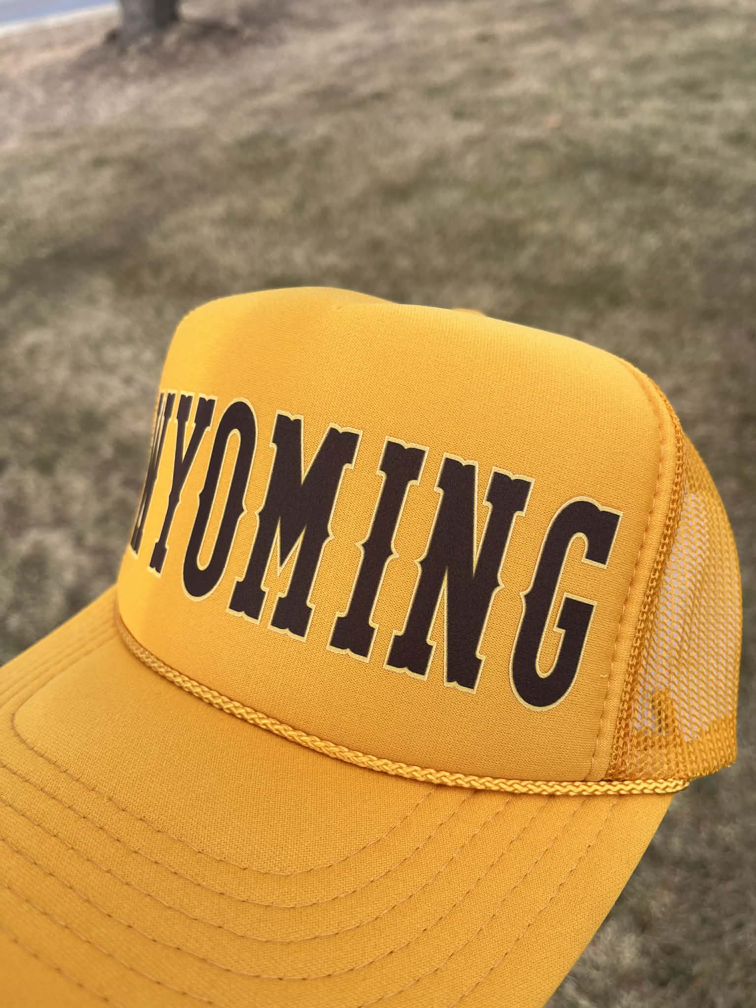 Shop Wyoming Wyoming Varsity Trucker Hat Choose your color Shop Wyoming Wyoming Varsity Trucker Hat Choose your color